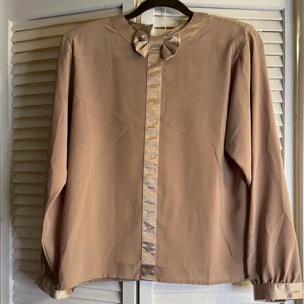 Gold silk blouse designed by Oscar de la Renta